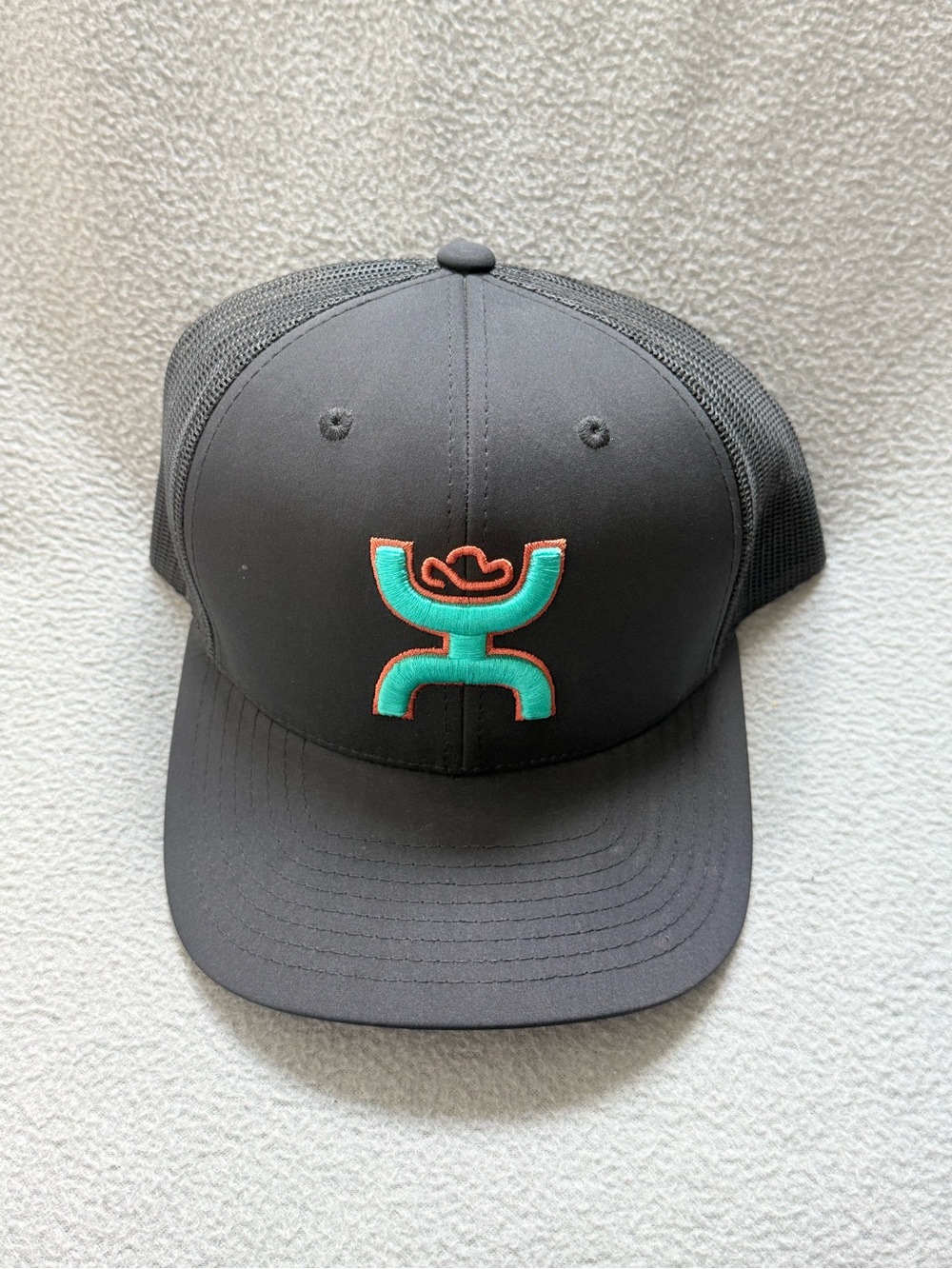 Equipment Black Mesh Trucker Cap with Teal and Orange Logo Accents